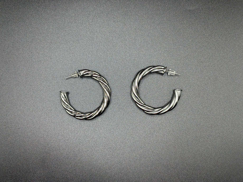 Boucles d’oreilles créoles torsadées argentées