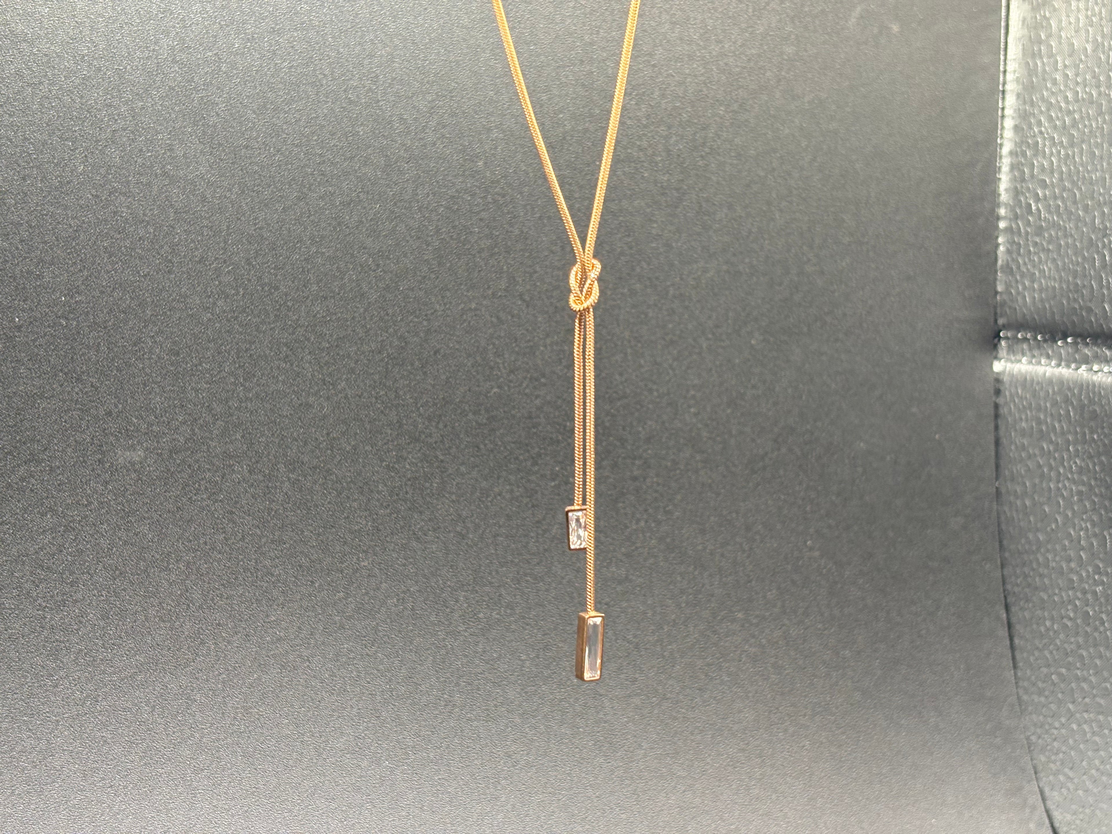 Collier Nœud Élégance – Finition Dorée