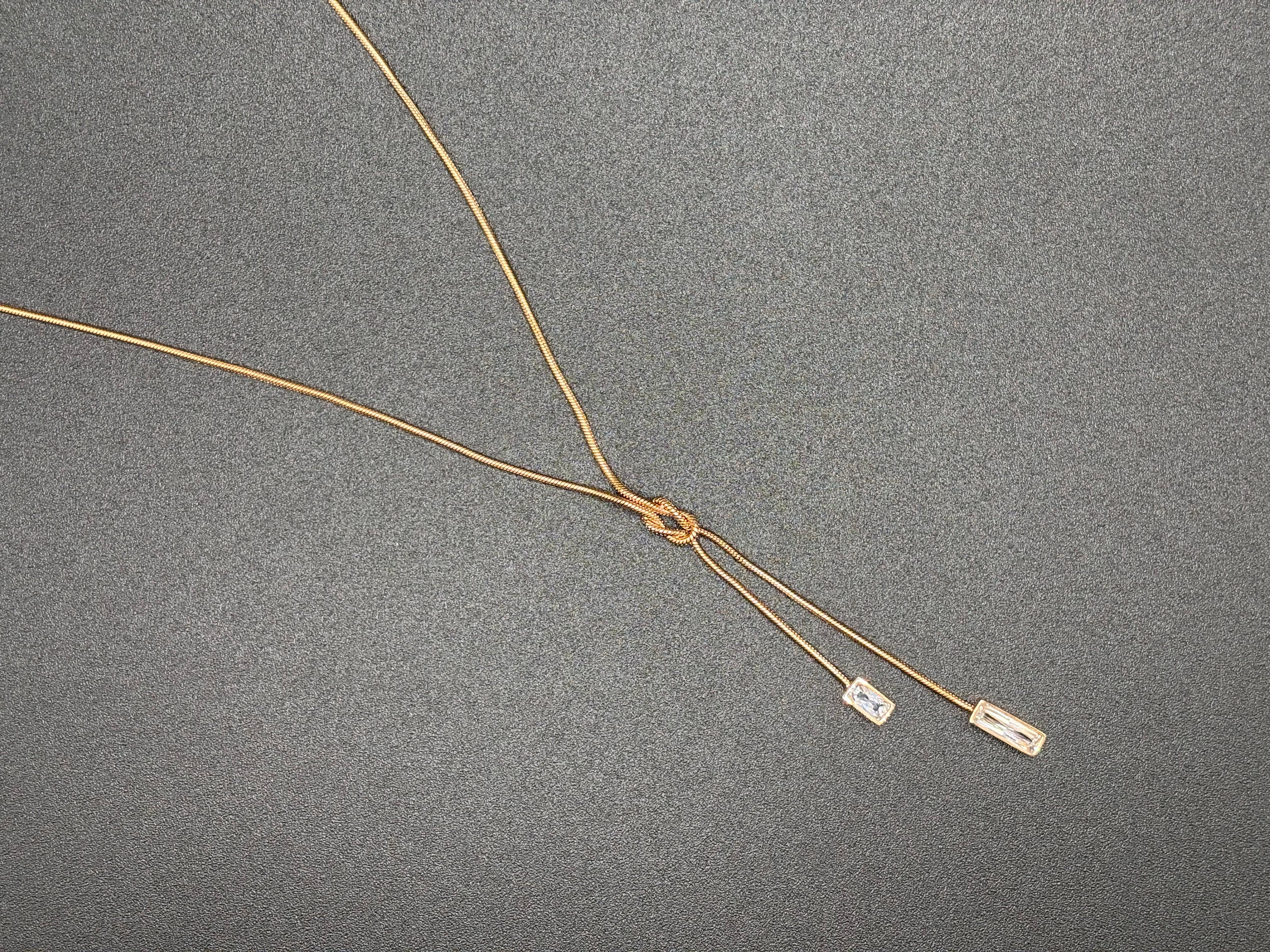 Collier Nœud Élégance – Finition Dorée