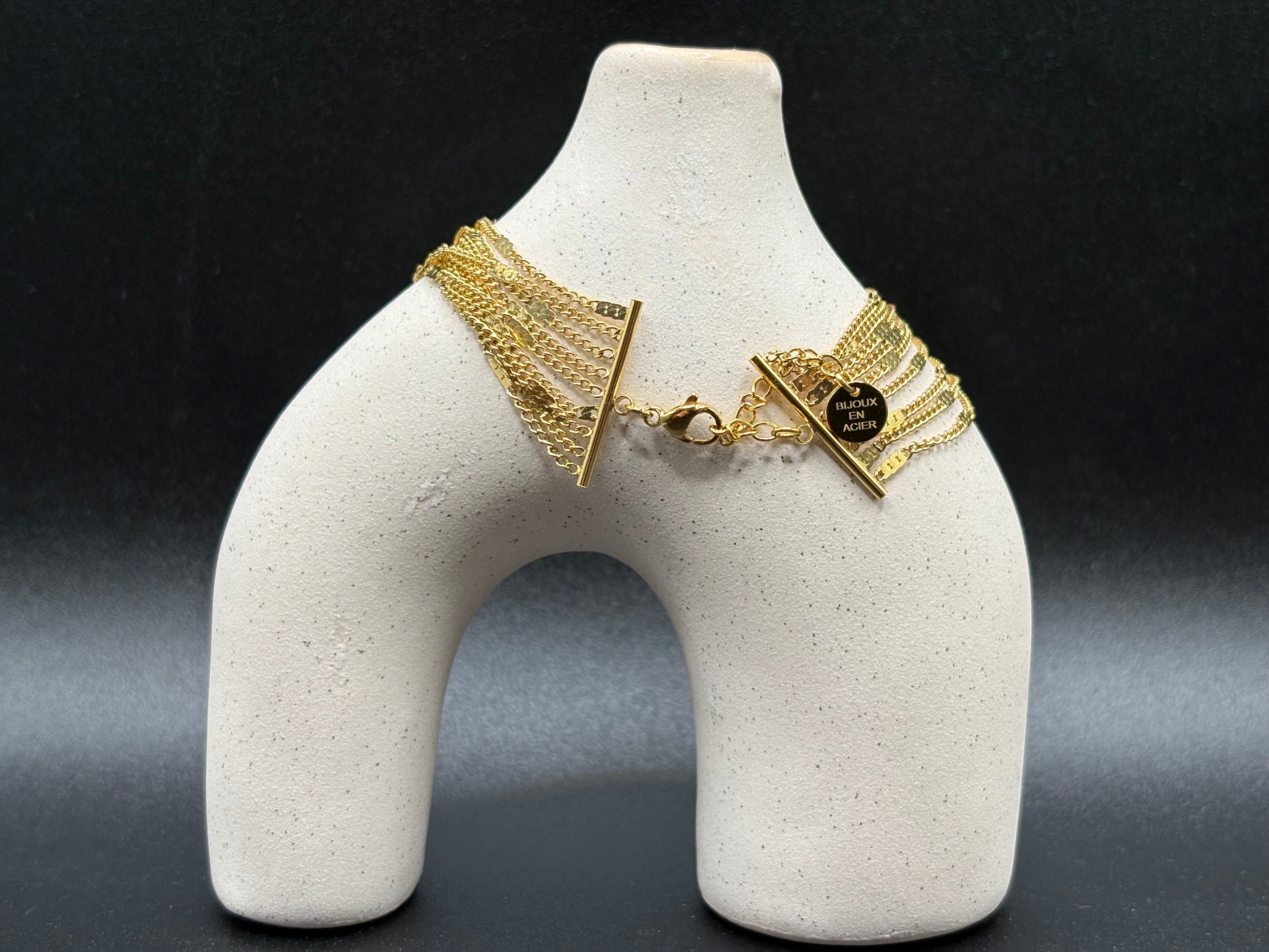 Bracelet multi-chaînes doré à barres verticales