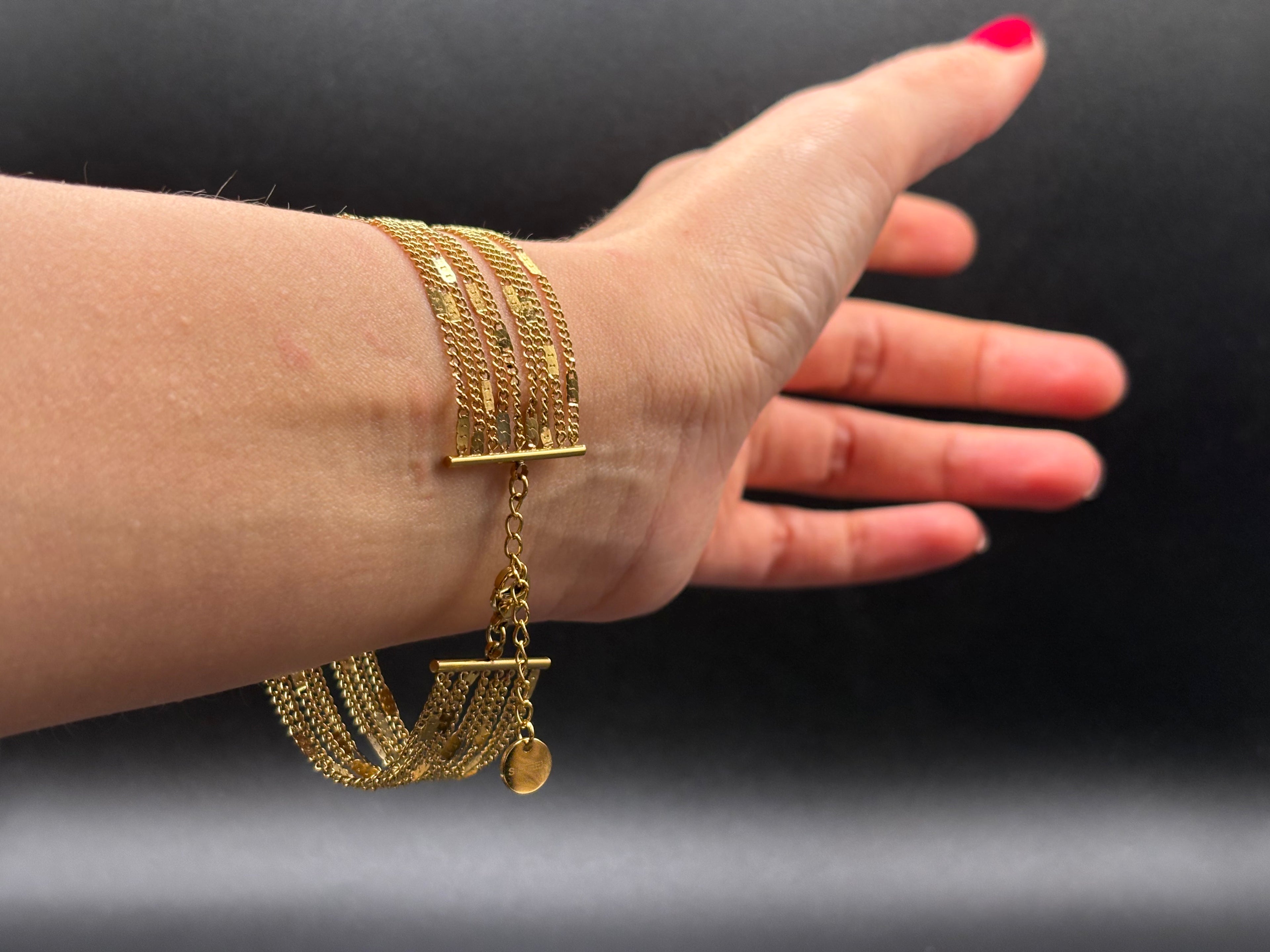 Bracelet multi-chaînes doré à barres verticales