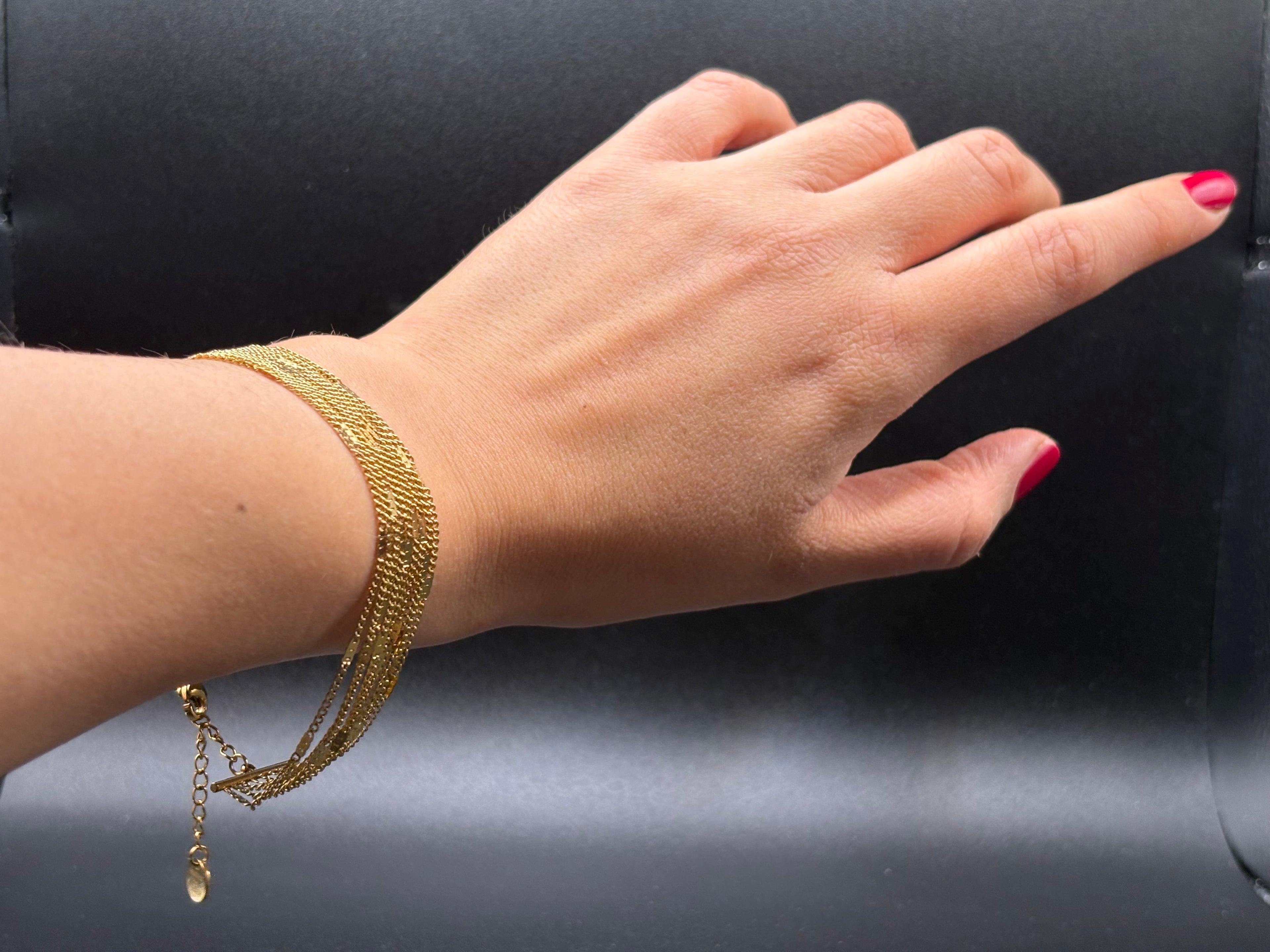 Bracelet multi-chaînes doré à barres verticales